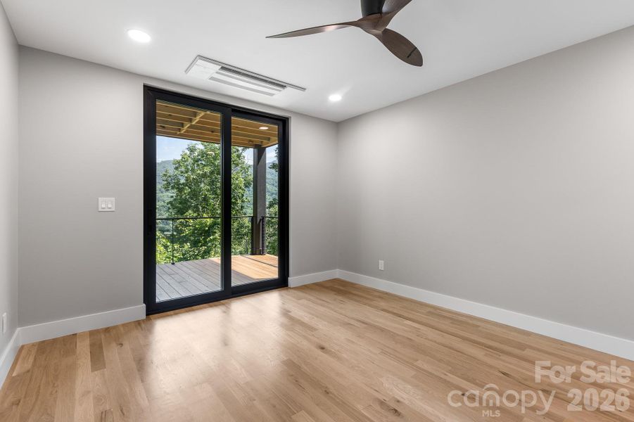 Spacious, unfurnished interior of a new home in , Waynesville (Image 24).