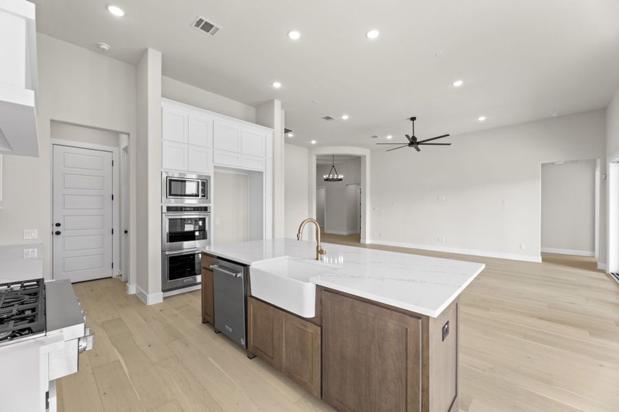 Representative furnished interior of a home built from the 5511 by Tradition Homes in Mustang Lakes, McKinney (Image 7).