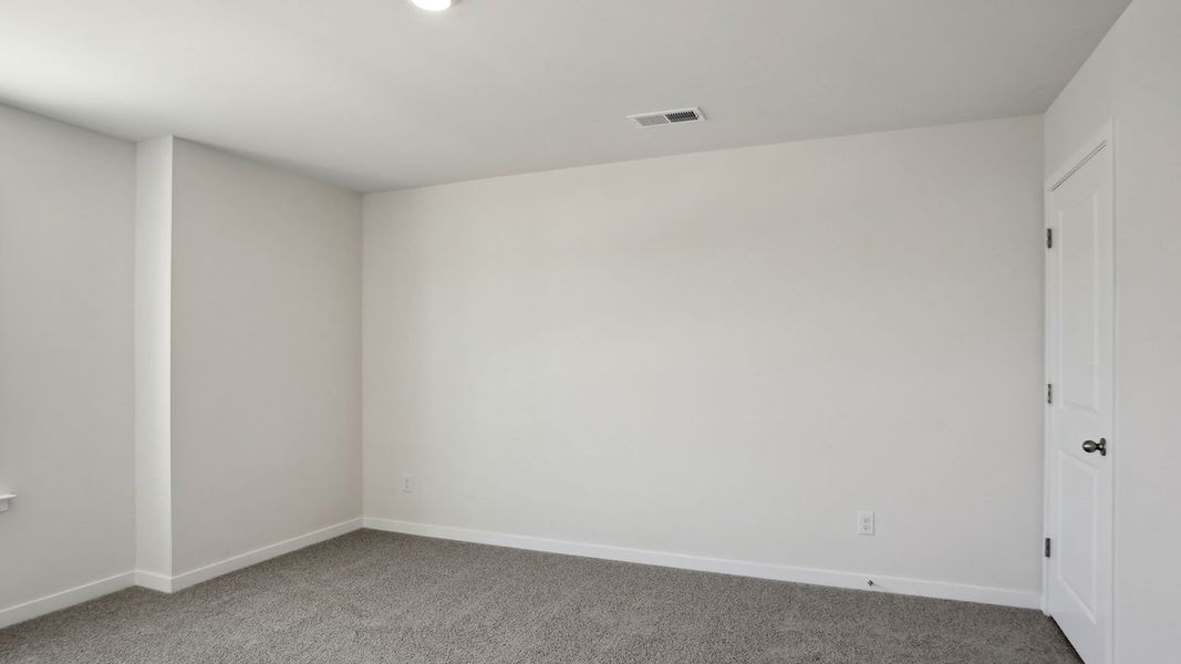 Spacious, unfurnished interior of a new home in Tap Root Farms, Fletcher (Image 18).