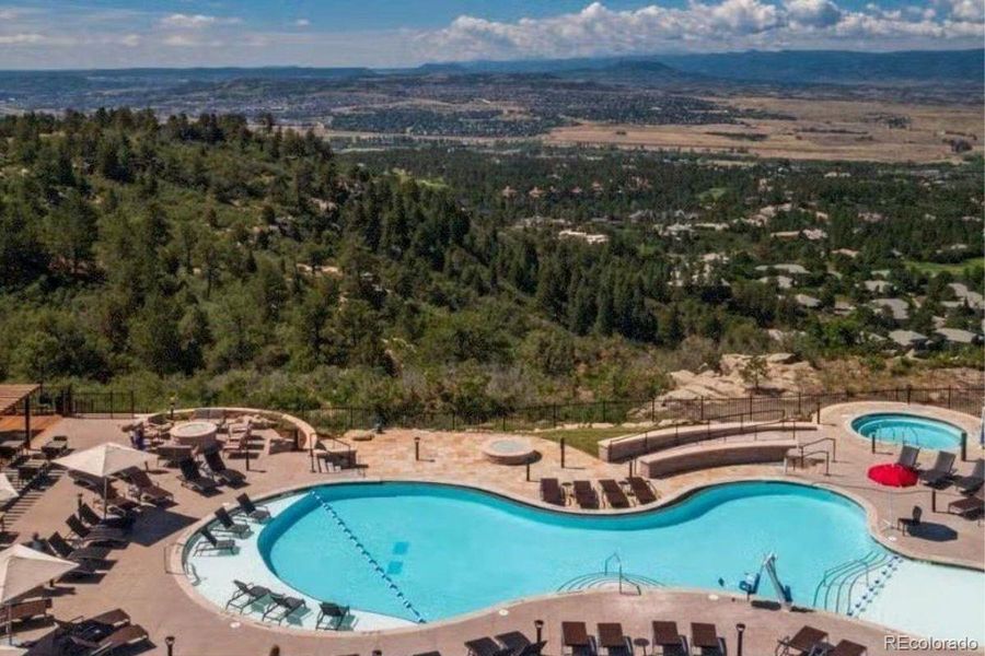 The breathtaking pool at the Country Club at Castle Pines offers incredible Front Range views.
