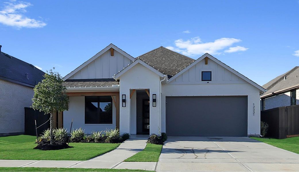 Front exterior of a new home in Riceland: 50ft. lots, Mont Belvieu, TX, highlighting curb appeal (Image 23).