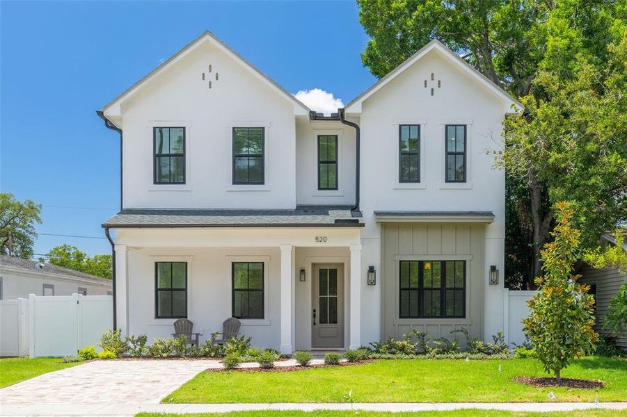 Front exterior of a new home in , St. Petersburg, FL, highlighting curb appeal (Image 26).