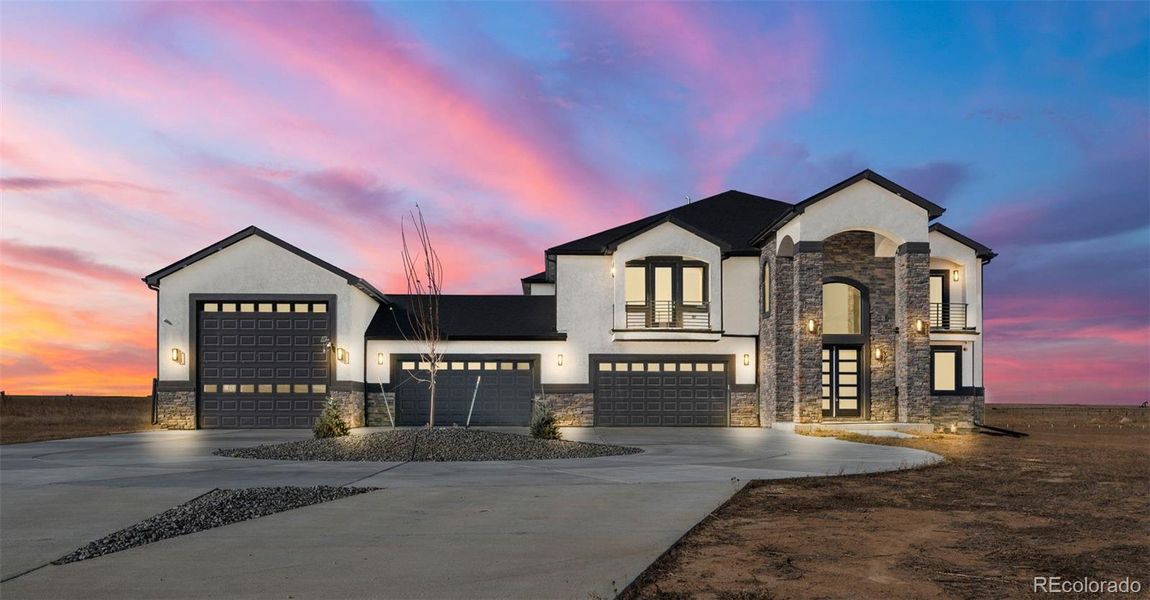 Front exterior of a new home in , Hudson, CO, highlighting curb appeal (Image 2).