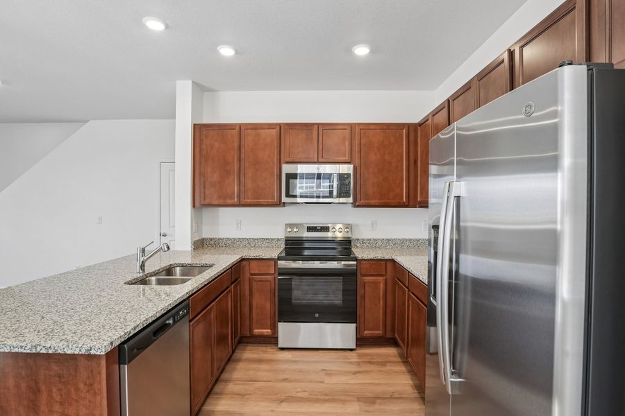Furnished interior view inside a new home in Windler, Aurora (Image 6).