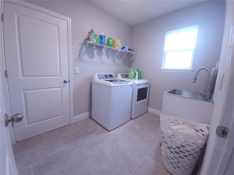 Furnished interior view inside a new home in Woodcreek, Wesley Chapel (Image 11).