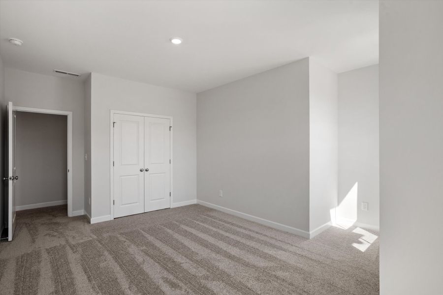 Spacious, unfurnished interior of a new home in Ovation at Sweetbrier, Durham (Image 24).