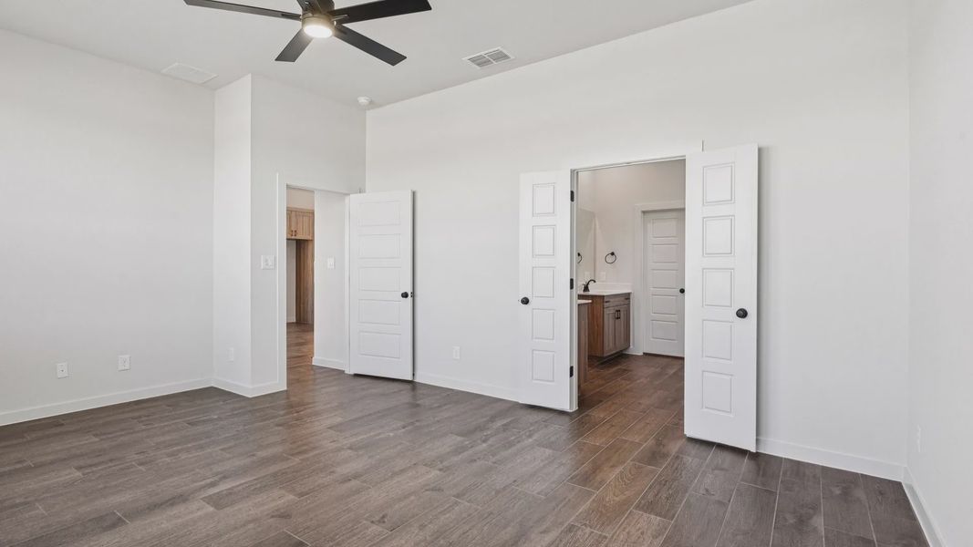 Representative unfurnished interior of a home built from the Marshall by Chesmar Homes in Stream Waters, Seguin (Image 17). Representative unfurnished interior of a home built from the Marshall by Chesmar Homes in Stream Waters, Seguin (Image 17).