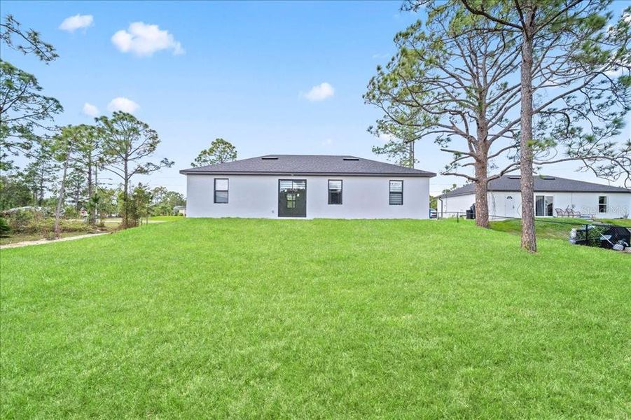Exterior details and patio area of a home in , Lehigh Acres (Image 4).