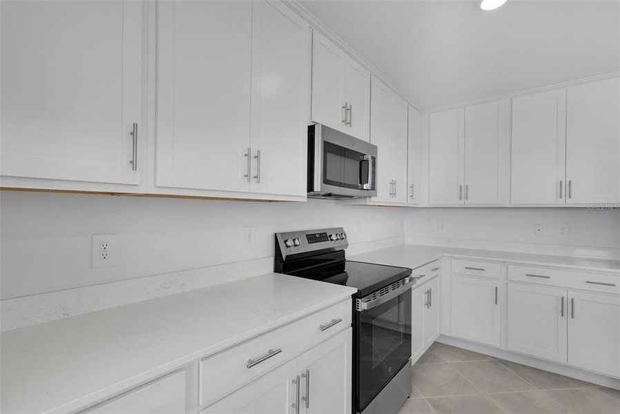 Furnished interior view inside a new home in Wellen Park Golf & Country Club, Venice (Image 10).