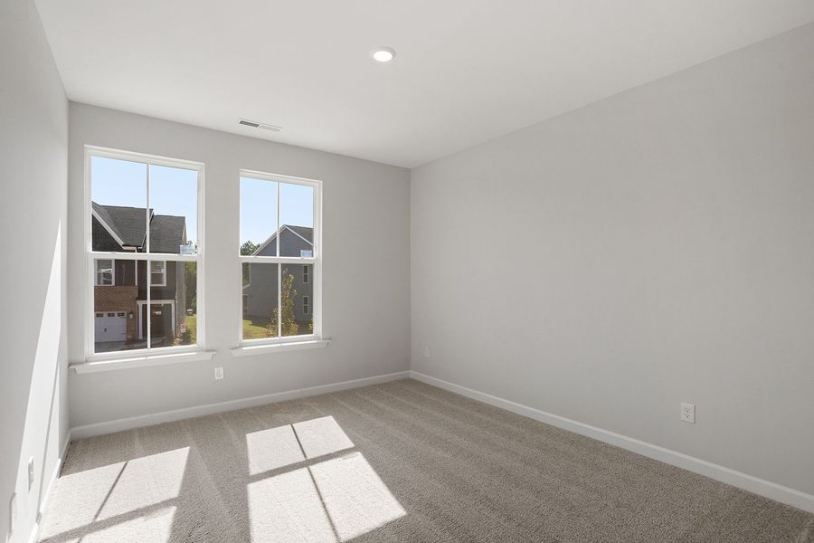 Spacious, unfurnished interior of a new home in Ovation at Sweetbrier, Durham (Image 28).