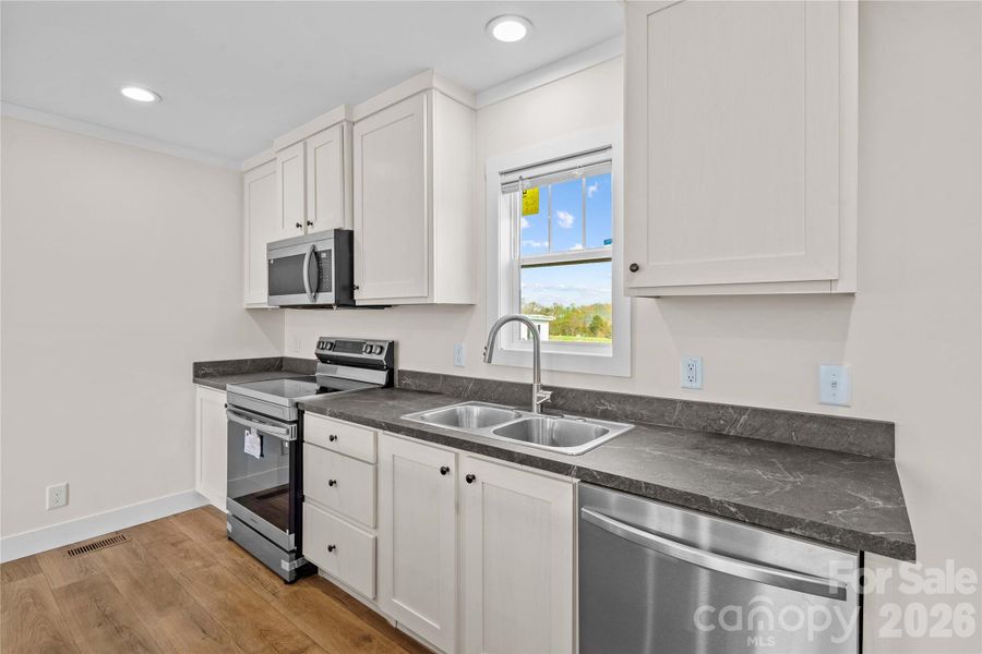 Furnished interior view inside a new home in , Hamptonville (Image 3).