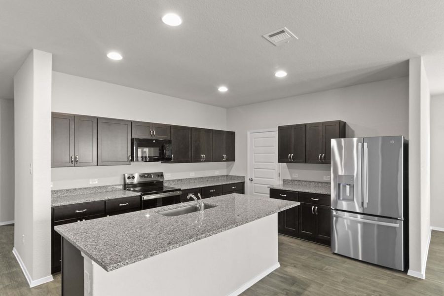Furnished interior view inside a new home in Oaks at San Gabriel, Georgetown (Image 6).