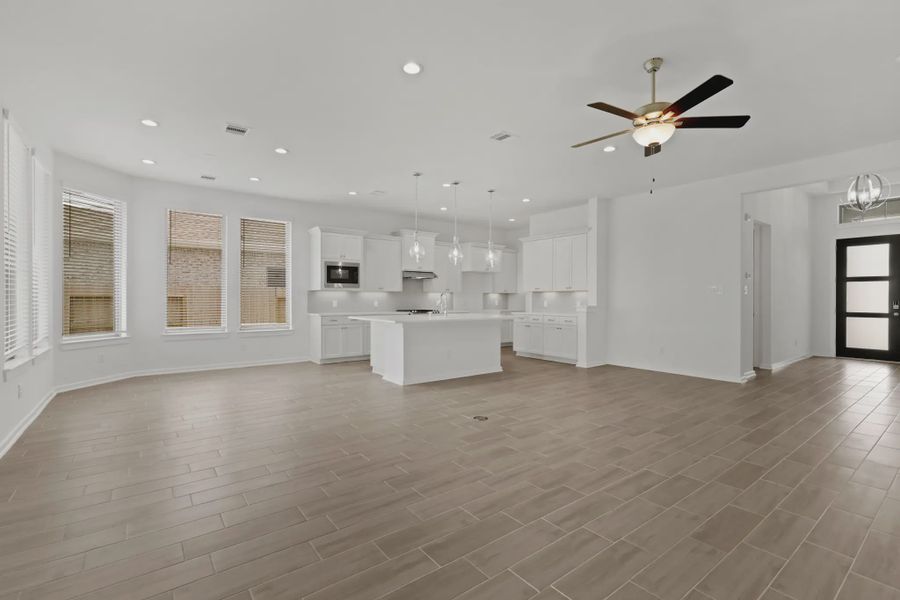 Representative unfurnished interior of a home built from the Payton by Chesmar Homes in The Highlands, Porter (Image 7).