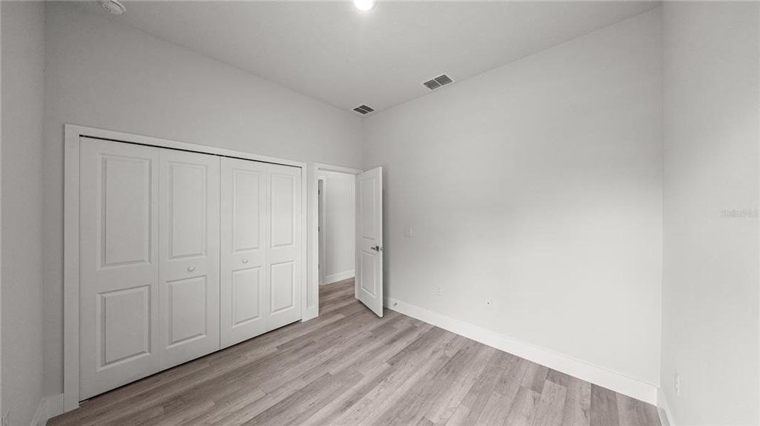 Spacious, unfurnished interior of a new home in , Port Charlotte (Image 21).