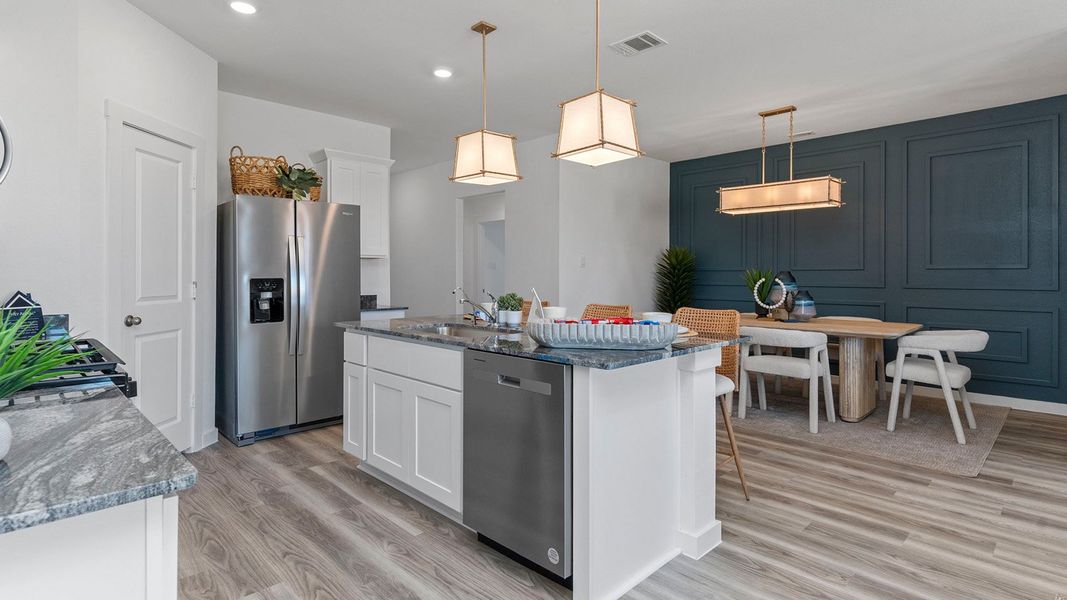 Representative furnished interior of a home built from the Harris by D.R. Horton in Watermark, Alvin (Image 7).