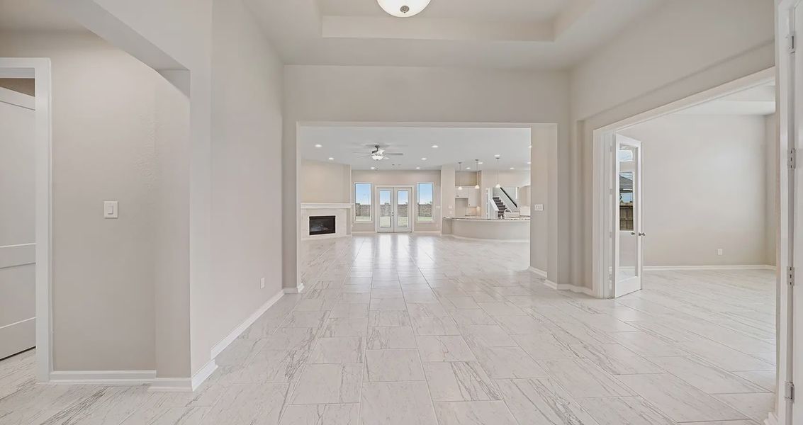 Representative unfurnished interior of a home built from the Oliver by Chesmar Homes in The Highlands, Porter (Image 7).