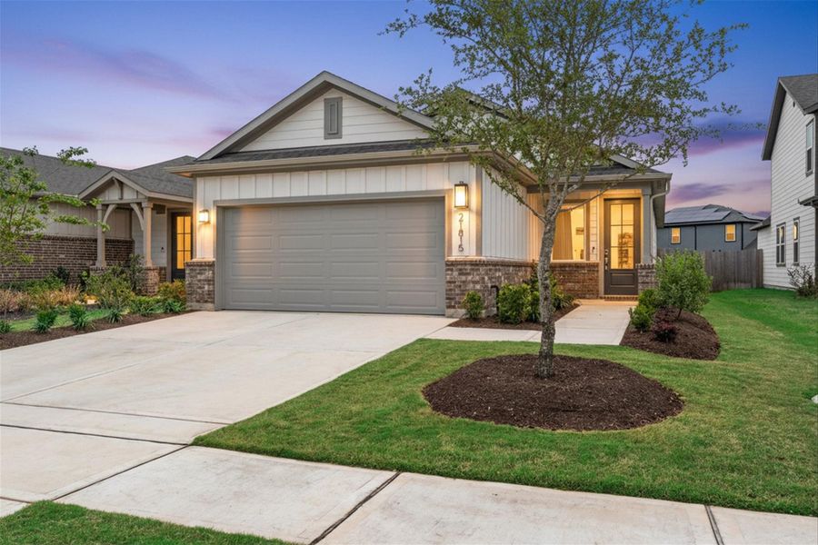 Front exterior of a new home in Mason Woods, Cypress, TX, highlighting curb appeal (Image 23).