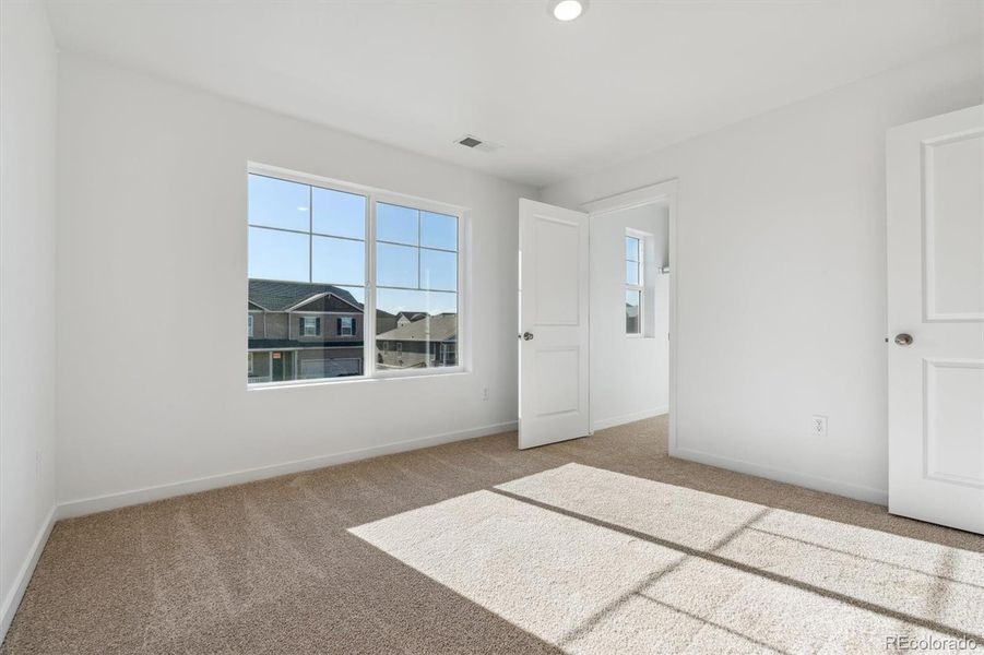 Spacious, unfurnished interior of a new home in Settlers Crossing, Commerce City (Image 20).