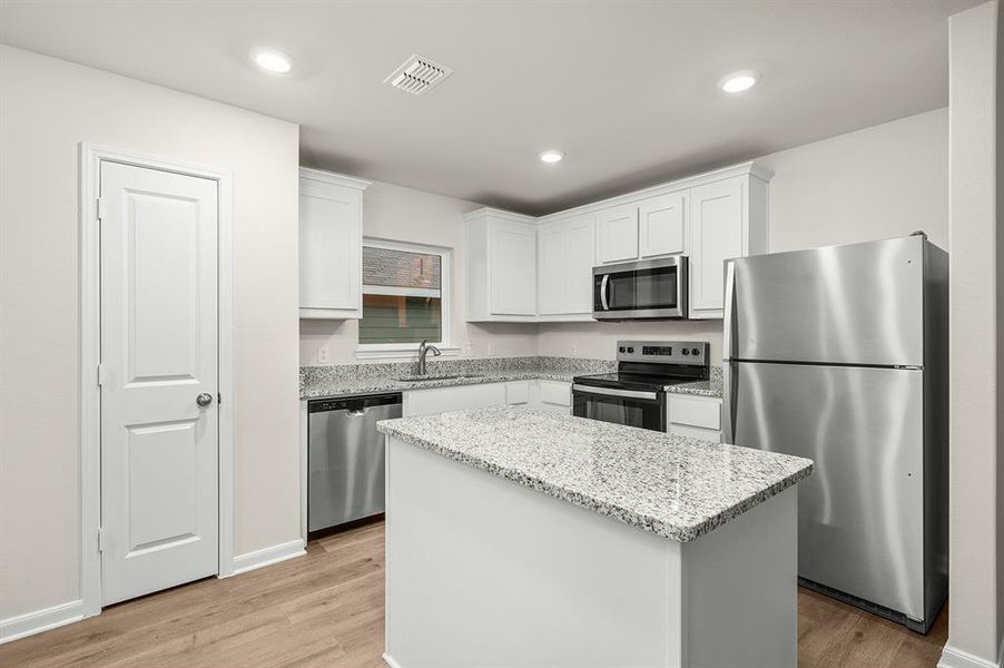 Furnished interior view inside a new home in Delano Estates, Greenville (Image 1).