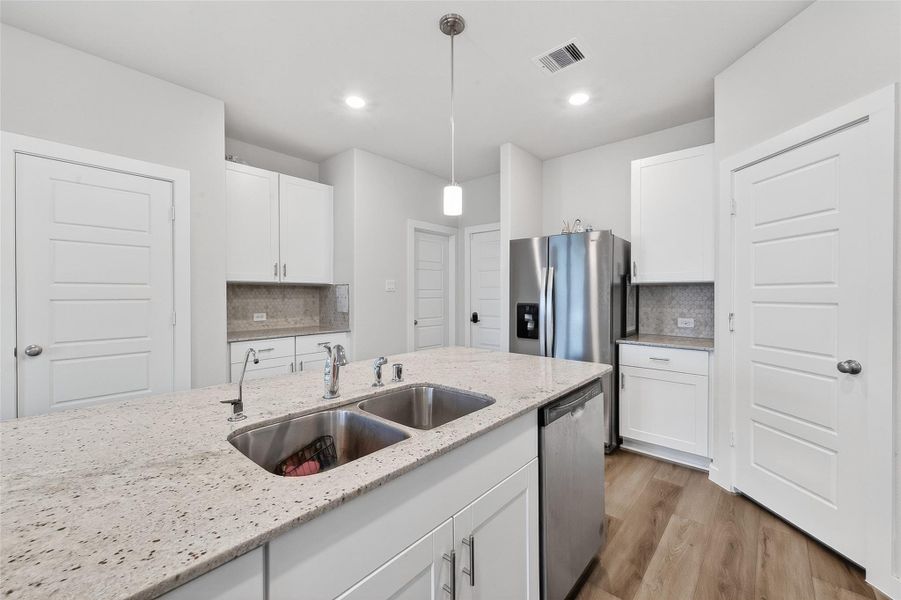 Furnished interior view inside a new home in McClendon Park Village, Houston (Image 6).