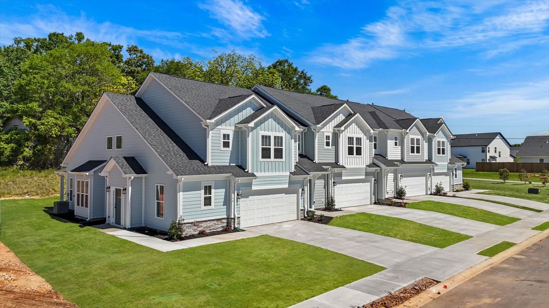 Front exterior of a new home in Village at Midway, Anderson, SC, highlighting curb appeal (Image 20).