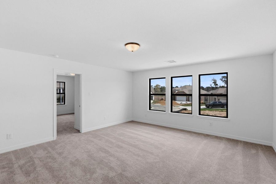 Spacious, unfurnished interior of a new home in Spring Creek Trails, Magnolia (Image 19).