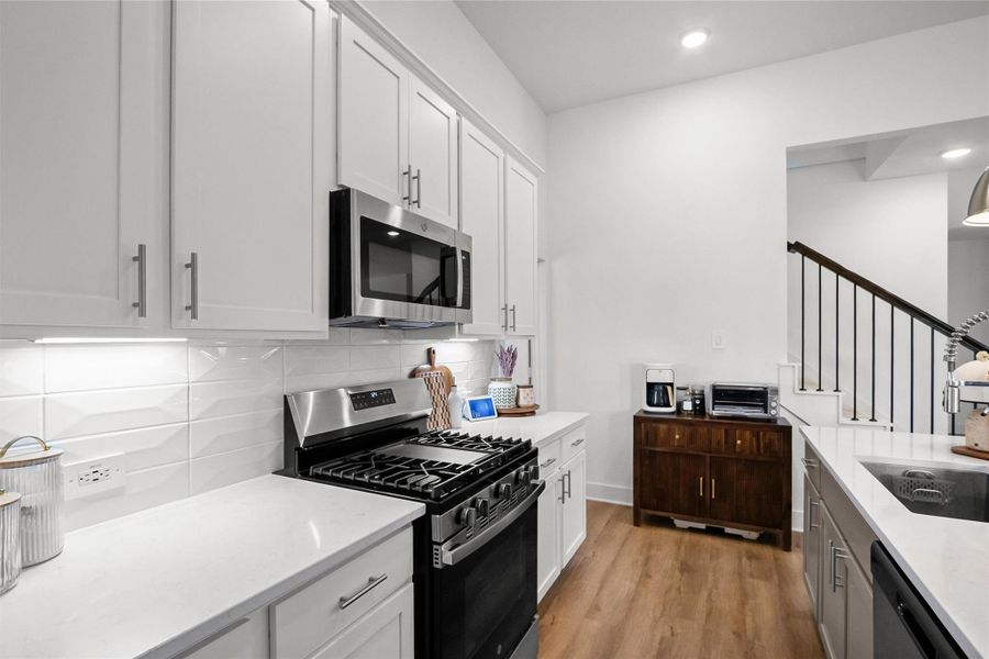 Furnished interior view inside a new home in Lone Star Landing, Montgomery (Image 8).