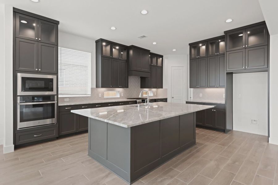 Representative furnished interior of a home built from the Rollins by Chesmar Homes in Gregg Ranch, Marble Falls (Image 4).