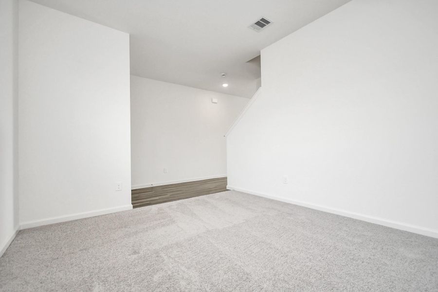 Spacious, unfurnished interior of a new home in Sunterra, Katy (Image 35).