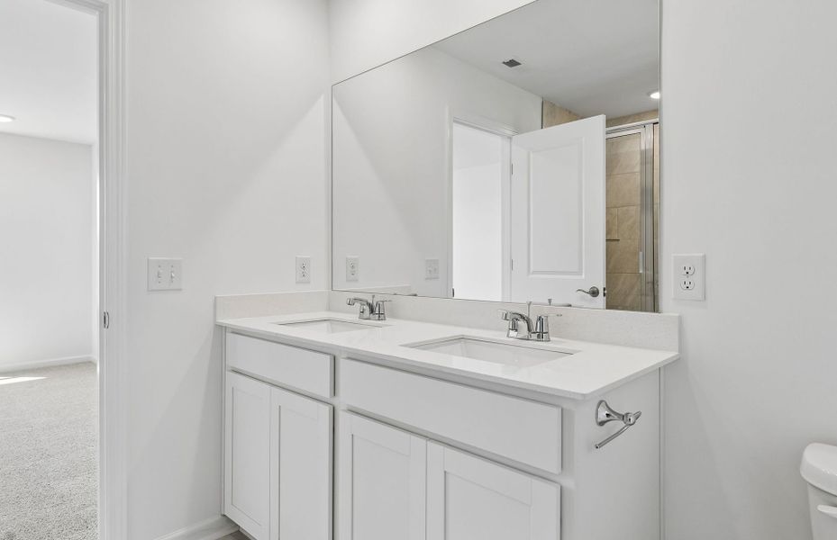 Furnished interior view inside a new home in Highlands of Carter's Station, Columbia (Image 11). Furnished interior view inside a new home in Highlands of Carter's Station, Columbia (Image 11).