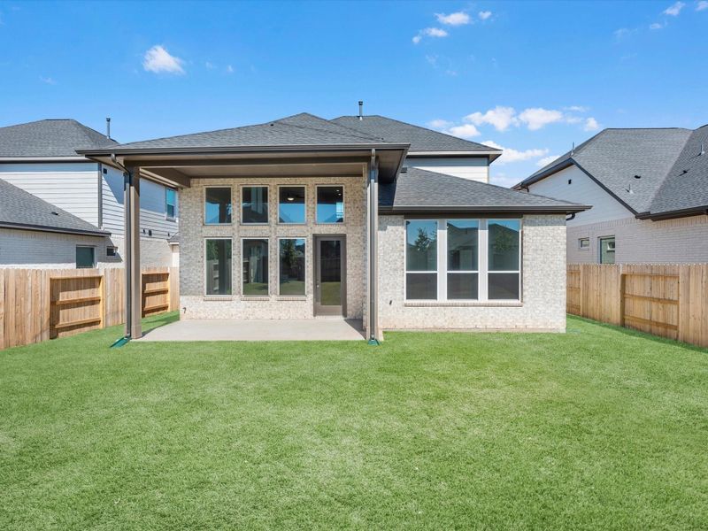 Exterior details and patio area of a home in Garden Glen at Clopton Farms, Montgomery (Image 1).