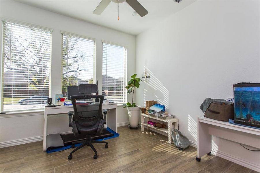 Office area featuring ceiling fan