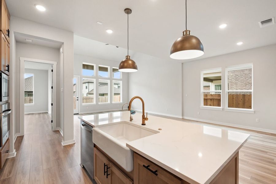 Furnished interior view inside a new home in Arbor Collection at Lariat, Liberty Hill (Image 9). Furnished interior view inside a new home in Arbor Collection at Lariat, Liberty Hill (Image 9).