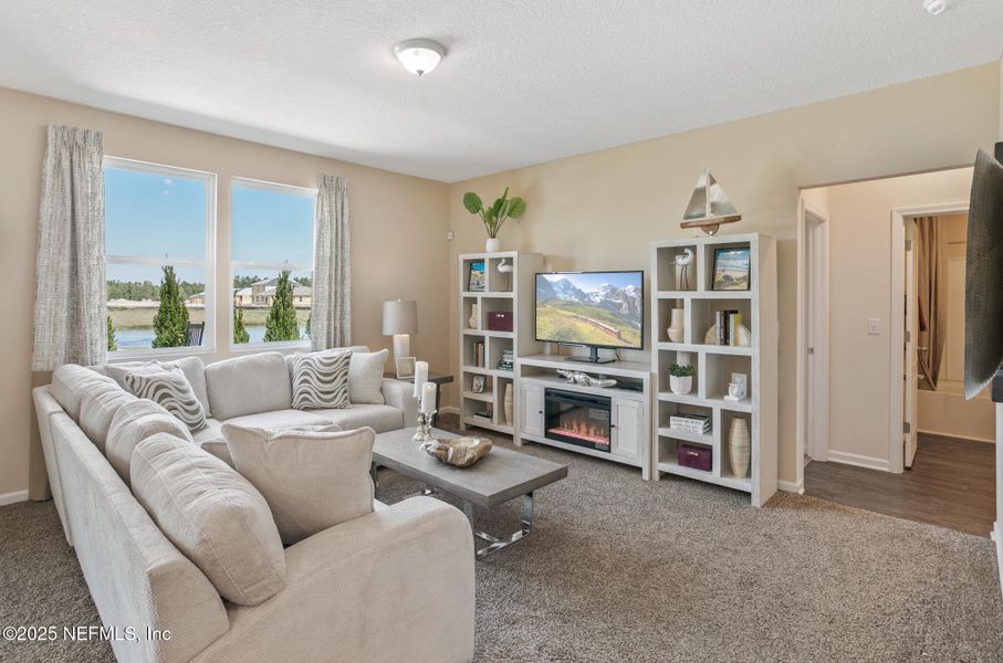 Furnished interior view inside a new home in Sawmill Branch, Palm Coast (Image 14).