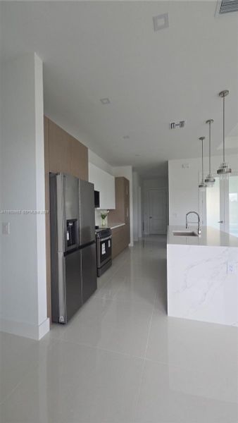 Furnished interior view inside a new home in , Lehigh Acres (Image 14).