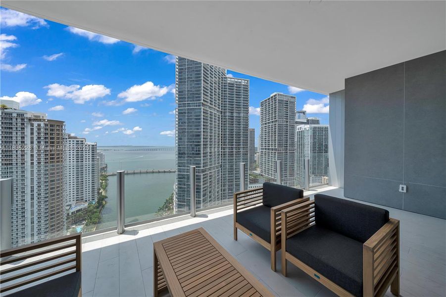 Front exterior of a new home in Aston Martin Residences, Miami, FL, highlighting curb appeal (Image 25).