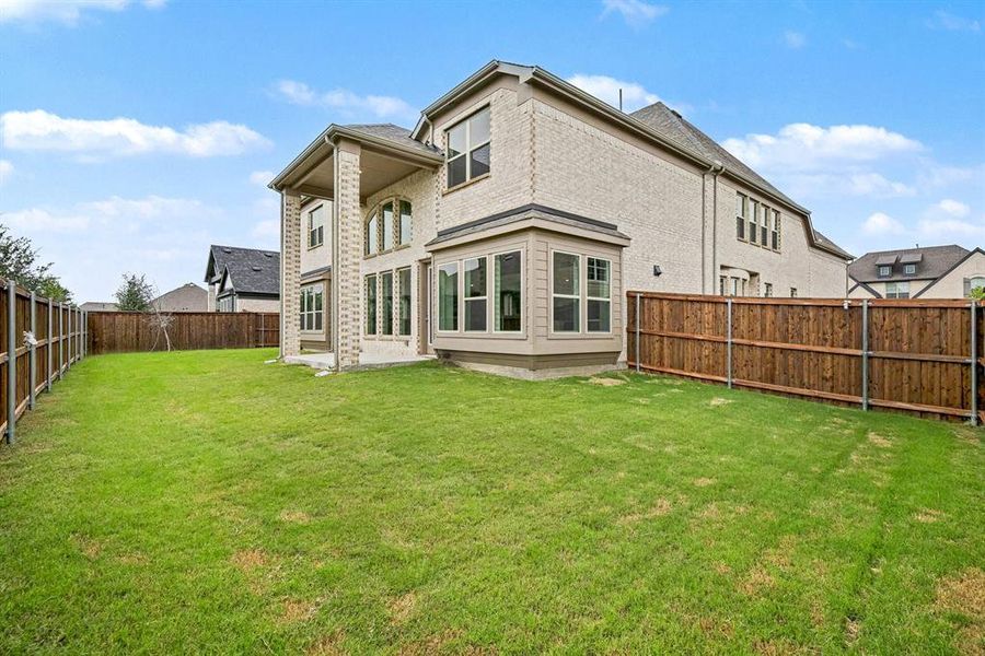 Exterior details and patio area of a home in , Mansfield (Image 20).