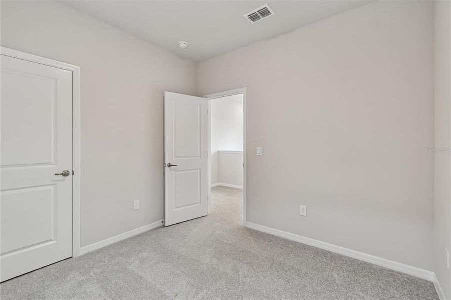 Spacious, unfurnished interior of a new home in Laureate Park at Lake Nona - Garden Series, Orlando (Image 37).