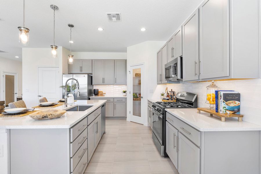 Furnished interior view inside a new home in The Sanctuary – Coastal Collection, Punta Gorda (Image 36).