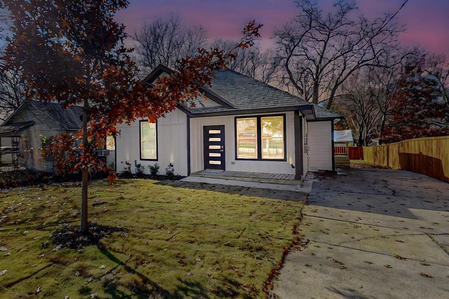 View of front of home featuring a yard