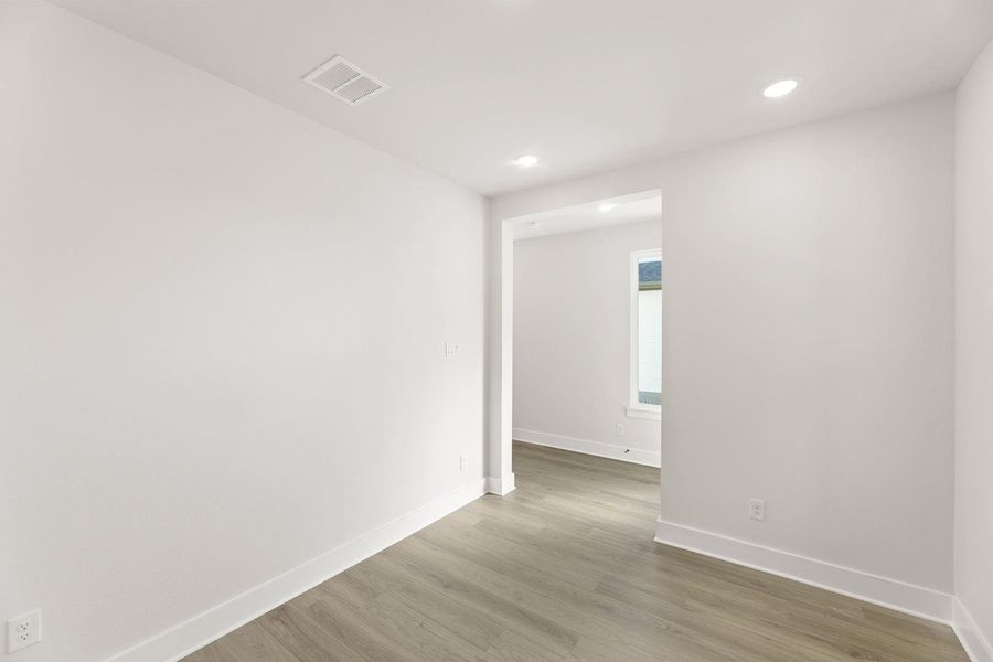 Spacious, unfurnished interior of a new home in Garden Collection at Harvest, Argyle (Image 15).