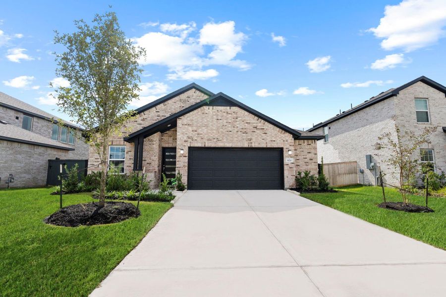 Welcome home to this gorgeous ranch-style beauty! The stunning brick exterior, wide driveway, and manicured green lawn create an unforgettable first impression. From the moment you pull up, you can imagine relaxing evenings on the porch or waving to friendly neighbors on this peaceful street. This home radiates warmth, comfort, and pride of ownership from every angle.
