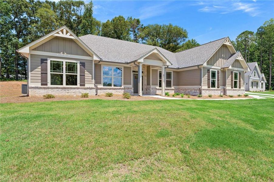 Front exterior of a new home in , Jefferson, GA, highlighting curb appeal (Image 27).