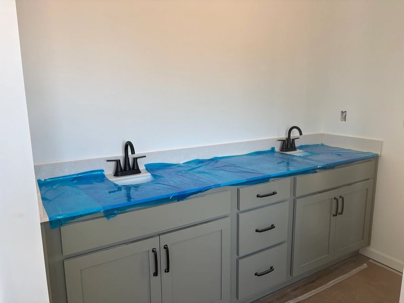 Primary Bath featuring the AW Collection® Rosemary - Organic textures meet bold design. Primary Bath featuring the AW Collection® Rosemary - Organic textures meet bold design.