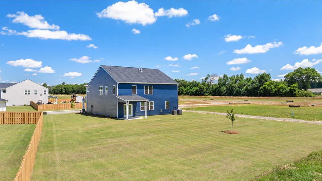 Front exterior of a new home in Southwind Village, Evans, GA, highlighting curb appeal (Image 23).