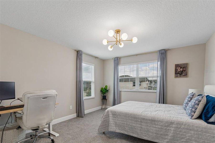 Furnished interior view inside a new home in Whispering Oaks Preserve, Wesley Chapel (Image 17).