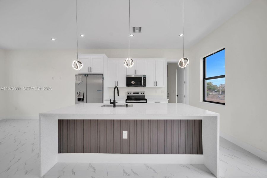 Furnished interior view inside a new home in , Lehigh Acres (Image 5).