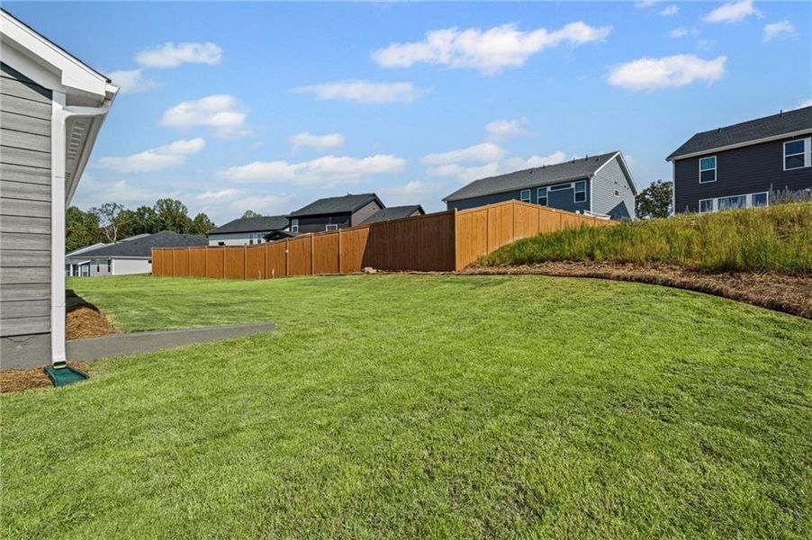 Front exterior of a new home in The Reserve At Liberty Park, Braselton, GA, highlighting curb appeal (Image 26). Front exterior of a new home in The Reserve At Liberty Park, Braselton, GA, highlighting curb appeal (Image 26).