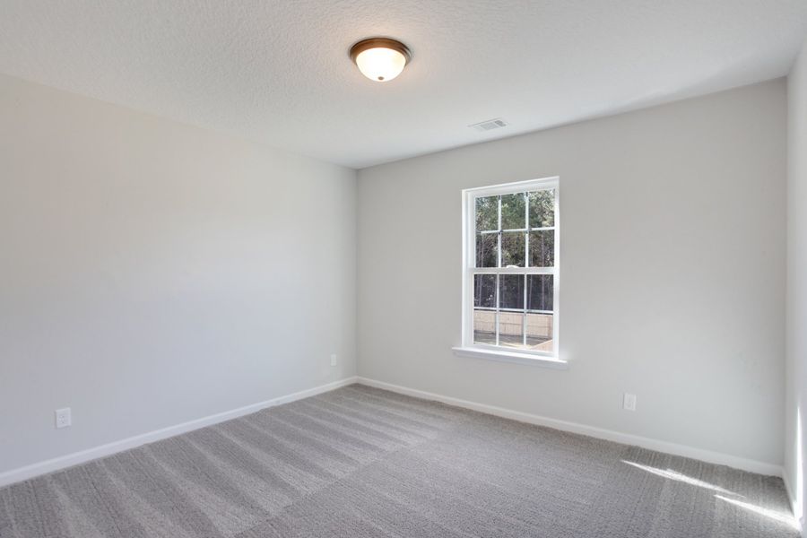 Representative unfurnished interior of a home built from the The Ryon by RTS Homes in Grand Reserve, Hinesville (Image 27).