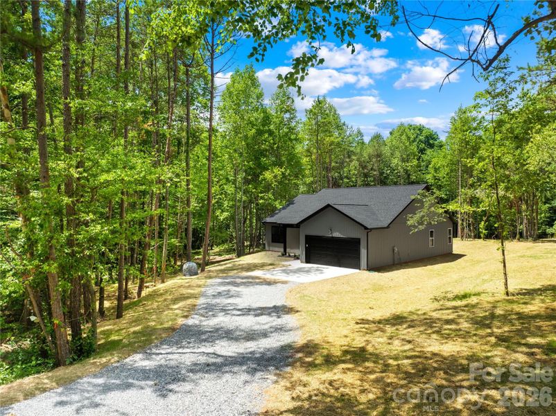 Front exterior of a new home in , Statesville, NC, highlighting curb appeal (Image 18).